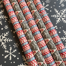 Various coloured Christmas wrapping papers