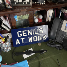 GENIUS AT WORK