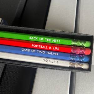 Set of four coloured pencils with 2b lead, in green, red, blue and white with various phrases