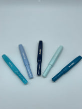 Kaweko Fountain pens in blue from left to right: Blueberry, Mellow, Navy, Mint and Cian