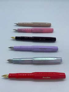 Kaweko Fountain Pens from the top: macchiato, Blush Pitaya, Bordeaux, Lavender, Irridescent Pearl, Red