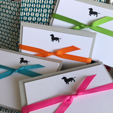Smooth haired miniature dachshund notecards tied with Neon ribbons in Pink, Orange, Green and Blue complete with premium envelopes make perfect gifts for dog lovers